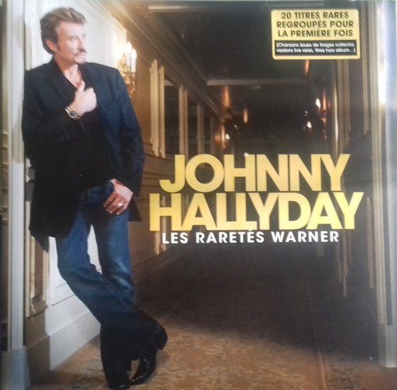 Johnny Hallyday album cover, "Les Raretes", featuring a portrait of the singer.