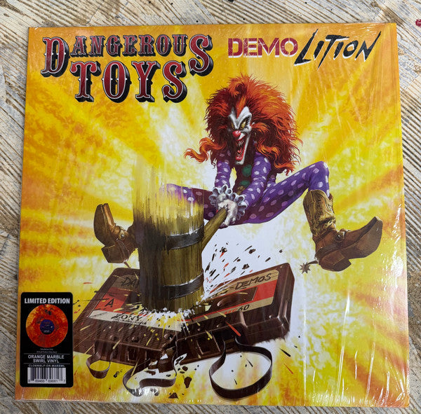 Dangerous Toys - Demolition" vinyl record cover featuring a clown and tank.