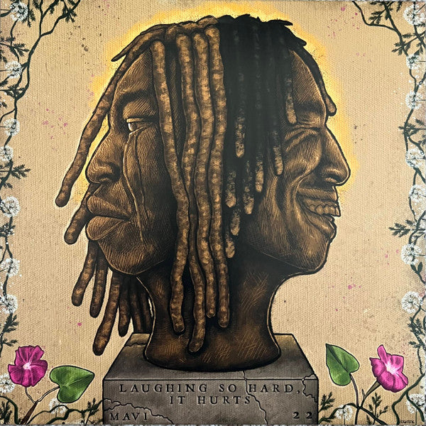Vinyl album cover featuring a split, illustrated face with dreadlocks.