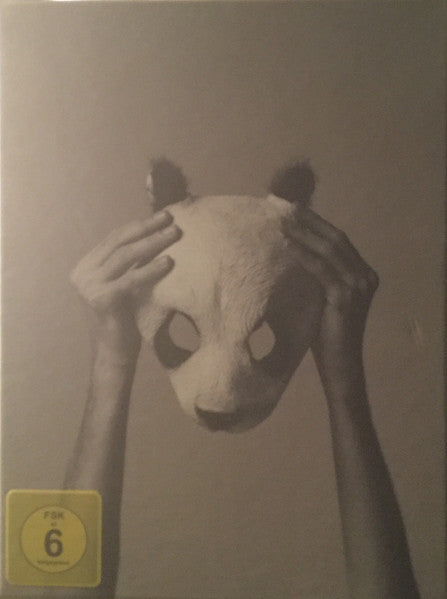 Blu-ray cover for "Suspense" featuring a person with a panda mask.