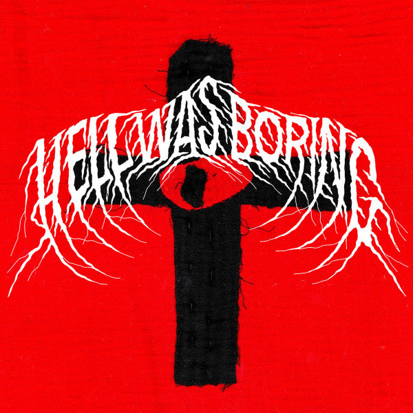 Red album cover with a black figure on a white, thorny cross.