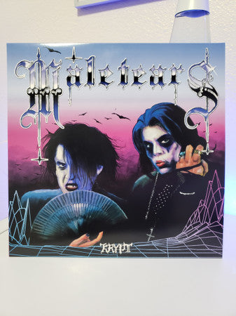 Vinyl record cover: two pale figures with dark hair against a neon landscape.