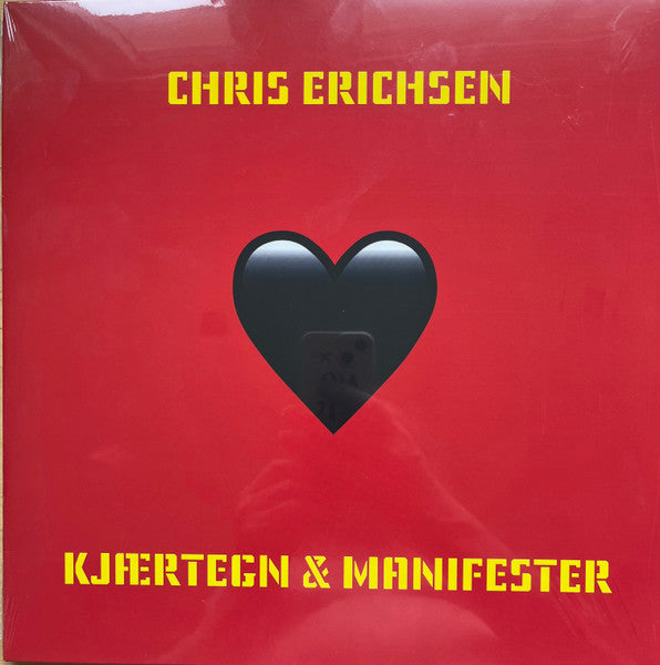 Red vinyl record cover with yellow text and a black heart design.