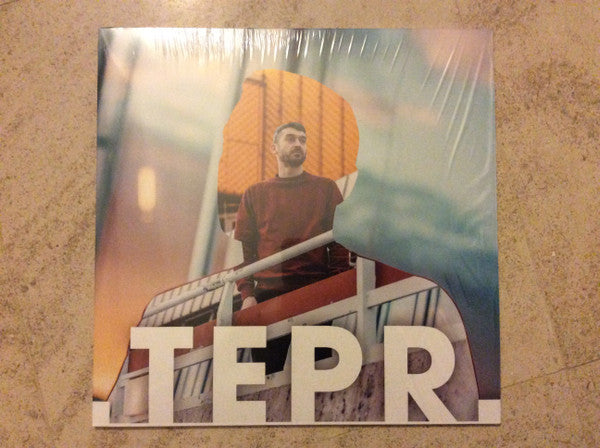 Vinyl record cover for Tepr’s “Inquisifunk” featuring a man and abstract art.