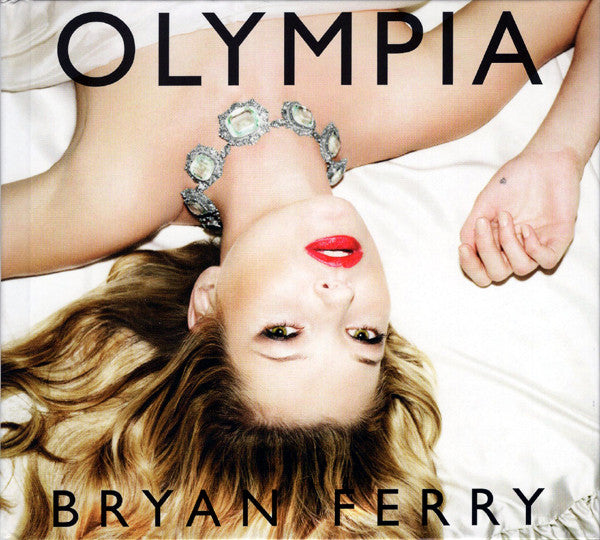 DVD cover for Bryan Ferry’s “Olympia” featuring a woman and jewelry.