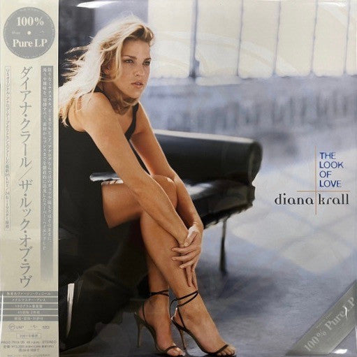 Diana Krall album cover: woman in black dress, seated, with Japanese text.