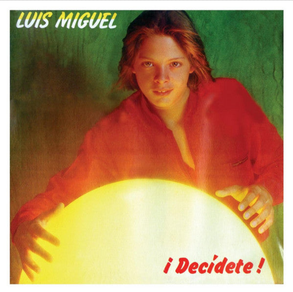 Luis Miguel album cover, young singer with a glowing orb.