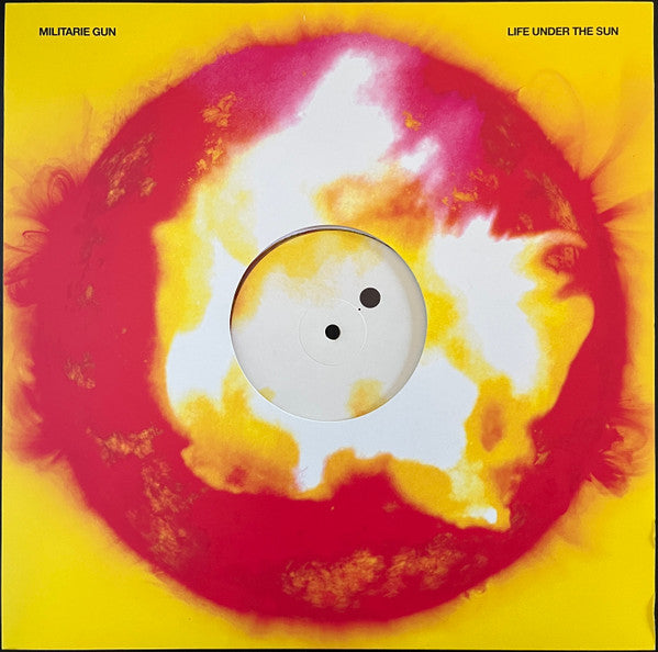 Vinyl record with a sun-like, abstract red and yellow cover.