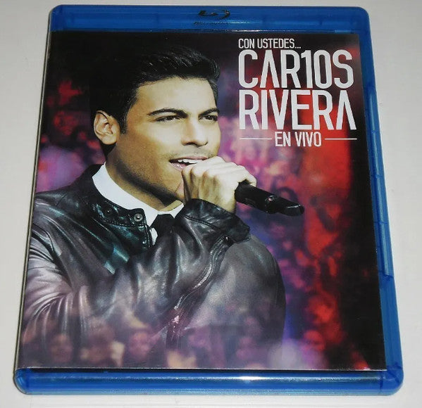 Blu-ray case featuring Carlos Rivera in concert, close-up portrait.