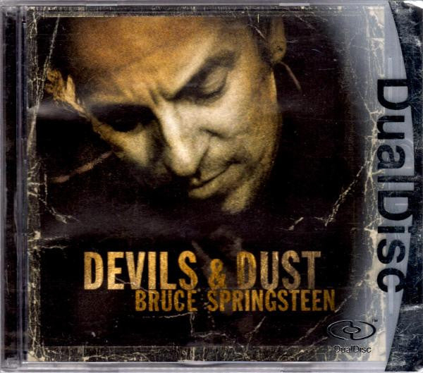 DVD cover for "Devils & Dust" featuring Bruce Springsteen’s portrait.