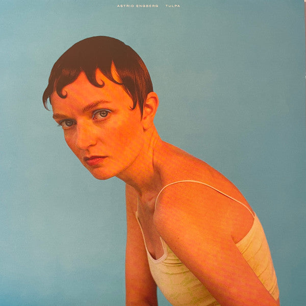 Record album cover featuring a portrait of a woman with short hair.
