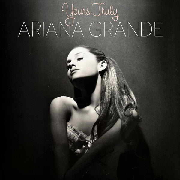 Black and white album cover for Ariana Grande’s “Yours Truly” featuring her portrait.