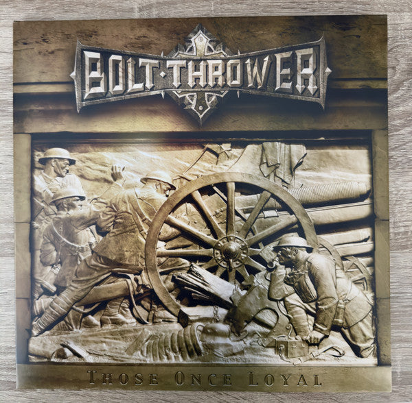 Bolt Thrower album cover: sepia-toned war memorial scene, vinyl record.