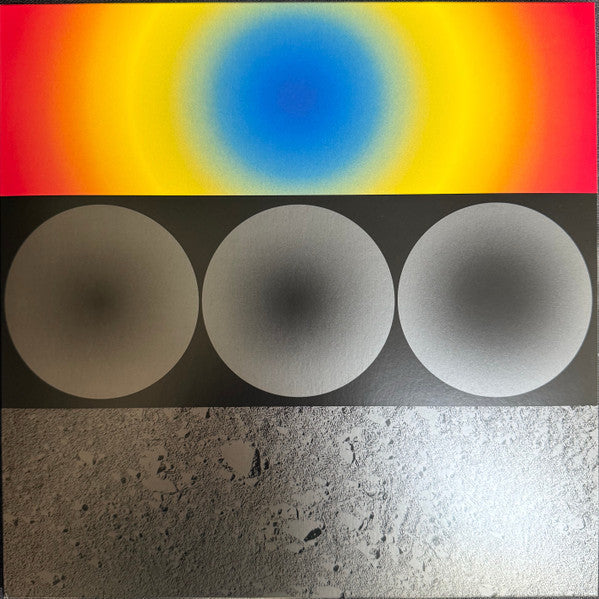 Vinyl record cover with abstract colorful and grayscale geometric shapes.