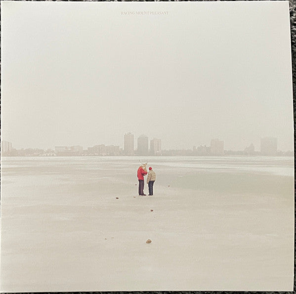 Album cover: two figures with antlers stand on a snowy, flat landscape.