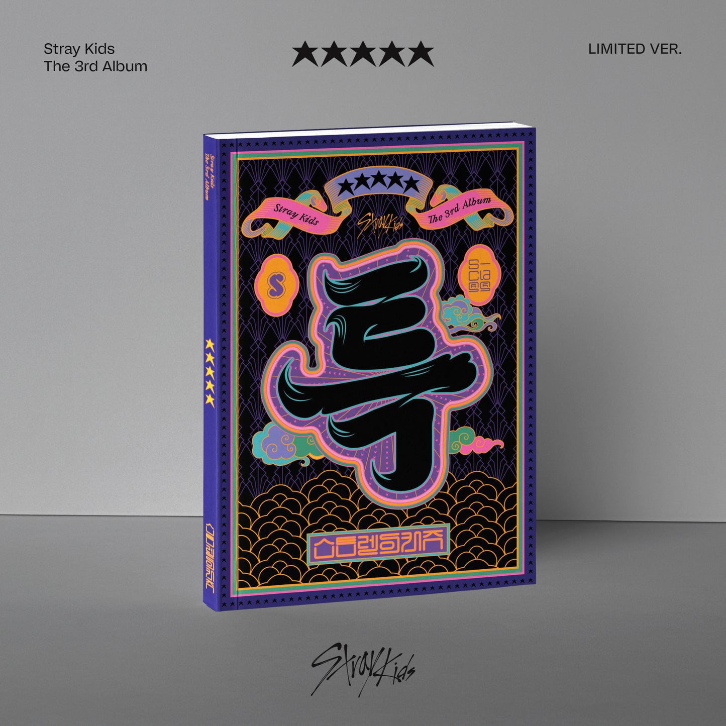 "Black book with a white question mark on the cover, gray background."