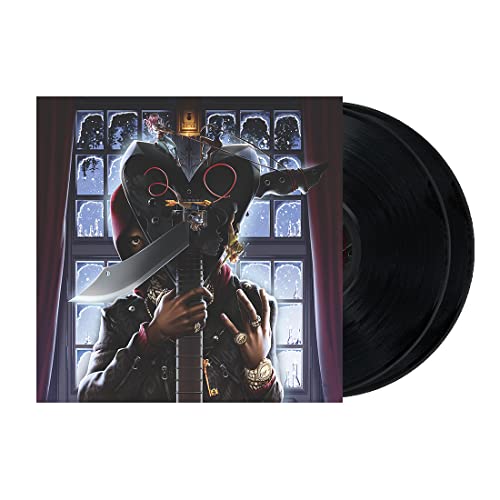 A Boogie Wit da Hoodie vinyl record with a masked figure on the cover.
