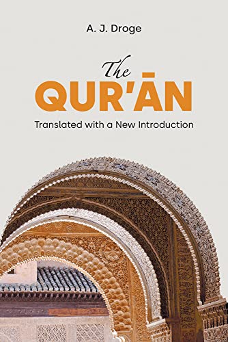 Book cover with title “The Qur’ān” and an Islamic archway.