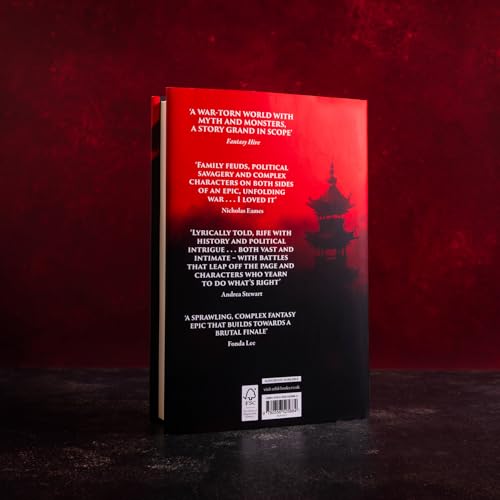 Book back cover with red background, silhouetted pagoda, and text excerpts.