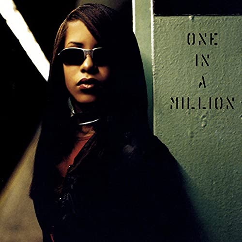 Aaliyah in sunglasses, album cover for “One In A Million” CD.