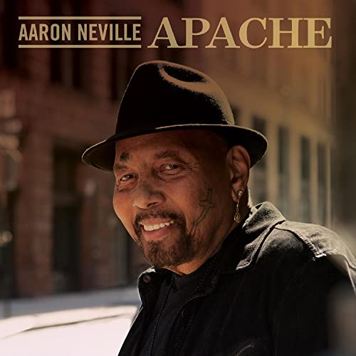 Aaron Neville portrait wearing a black hat, album cover for "Apache".