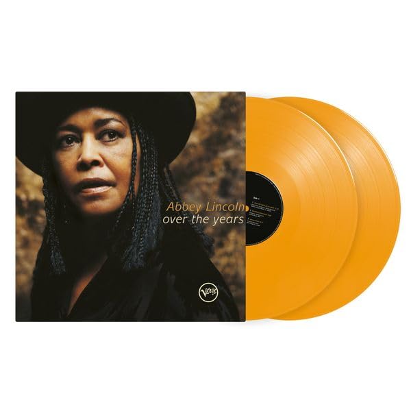 Abbey Lincoln album cover and two orange vinyl records.