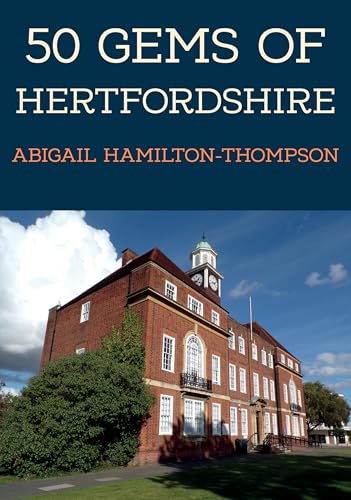Book cover featuring a red brick building with a clock tower.