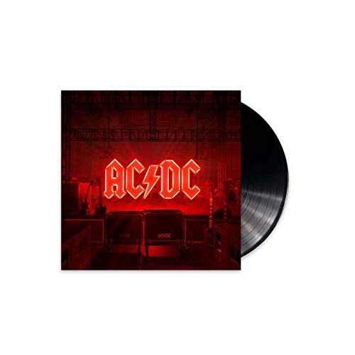 AC/DC “Power Up” vinyl record with red illuminated logo and stage backdrop.