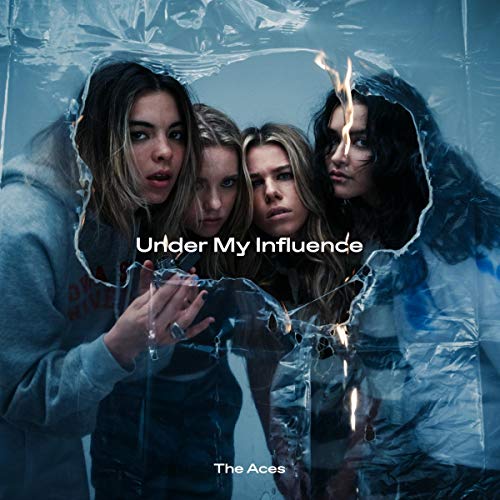 Album cover with four women breaking through plastic wrap, titled "Under My Influence".