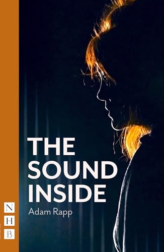 Book cover: Silhouette of a person’s profile with orange hair.