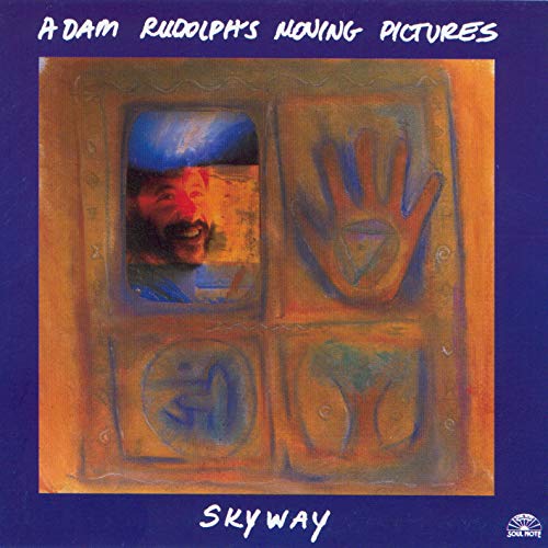 CD cover for Adam Rudolph’s “Skyway” featuring painted window and hand imagery.