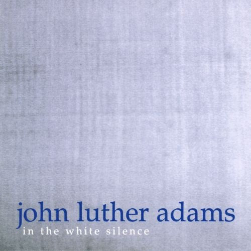 CD cover for John Luther Adams’ “In The White Silence,” blue text on gray.
