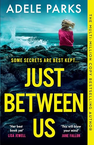 Book cover: woman by the sea, title “Just Between Us” in yellow.
