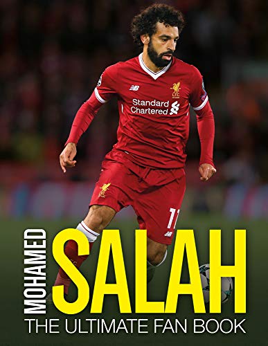 Mohamed Salah in a red Liverpool kit on the cover of a fan book.