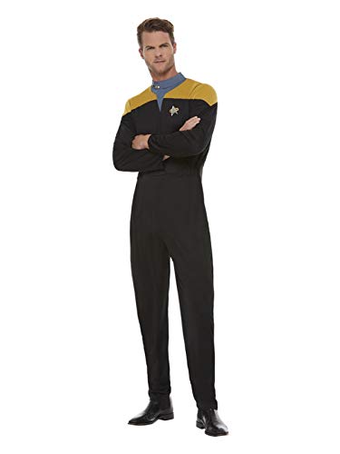 A man wearing a black and yellow Star Trek Voyager operations uniform jumpsuit.