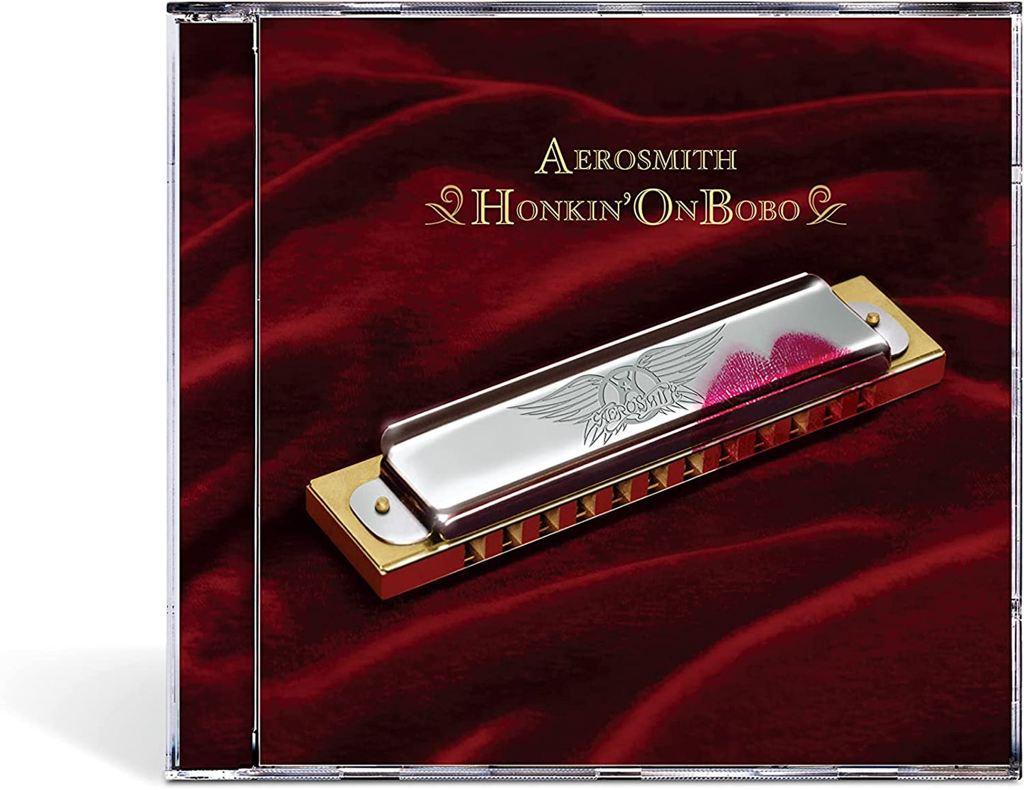 Aerosmith “Honkin’ On Bobo” CD cover featuring a harmonica.