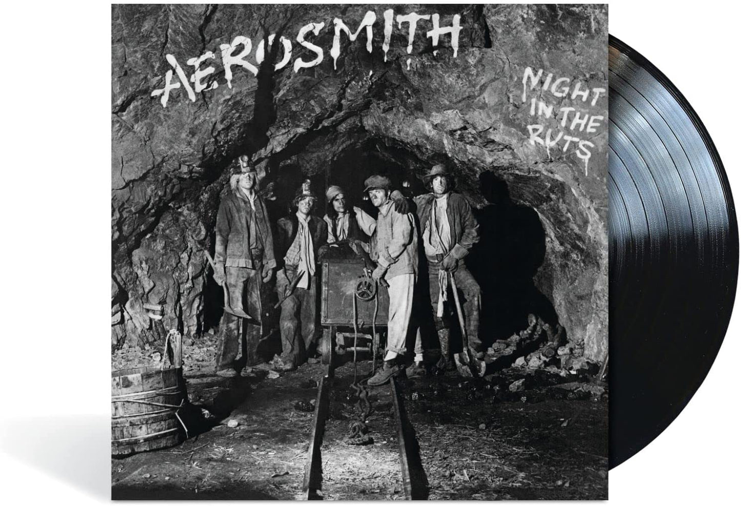 Aerosmith album cover, “Night In The Ruts,” with vinyl record shown.