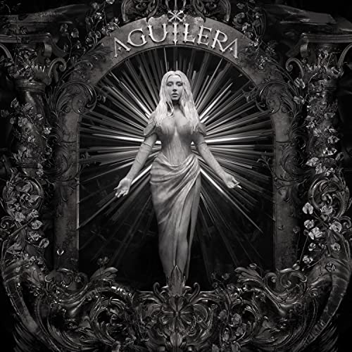 Christina Aguilera album cover, grayscale, ornate frame, woman in center.