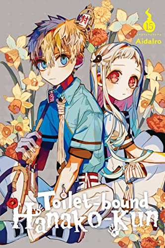 Manga volume 15 cover with two anime-style characters and yellow flowers.