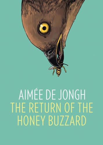 Close-up of a honey buzzard’s face with a bee in its beak.