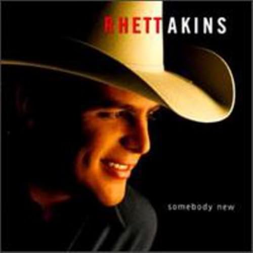 Rhett Akins CD cover featuring a man in a cowboy hat smiling.