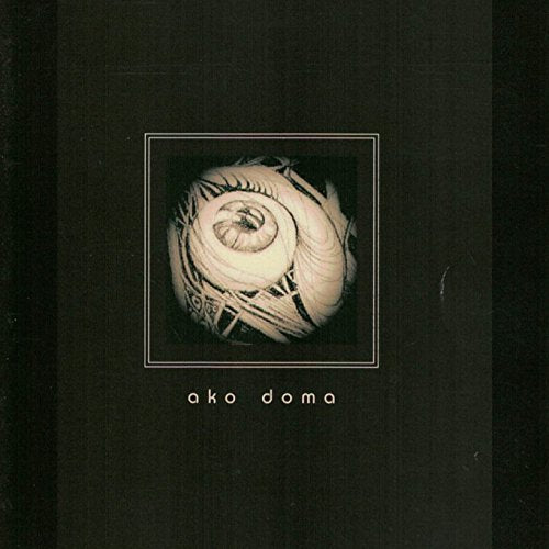 CD cover with a swirling, textured white design and text below.