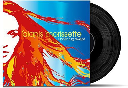 Alanis Morissette's album cover: abstract woman's face with flowing red hair on blue background.
