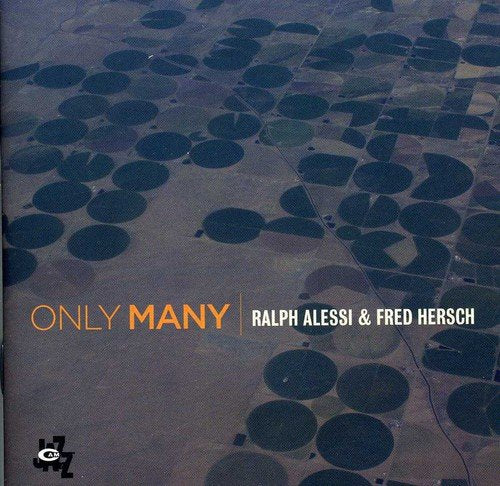 Aerial view of circular fields with "Only Many" and artist names on album cover.
