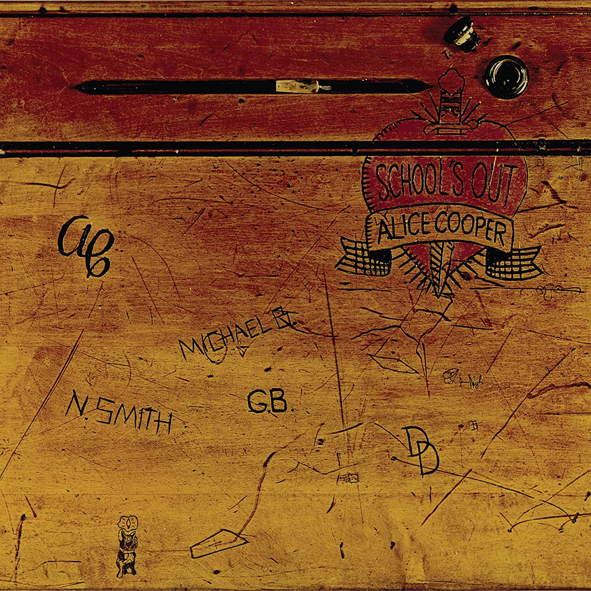 Alice Cooper’s “School’s Out” album cover: a scratched wooden desk.