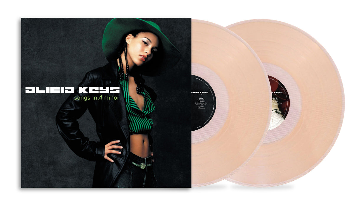 Alicia Keys Songs in A Minor album cover with two light pink vinyl records.