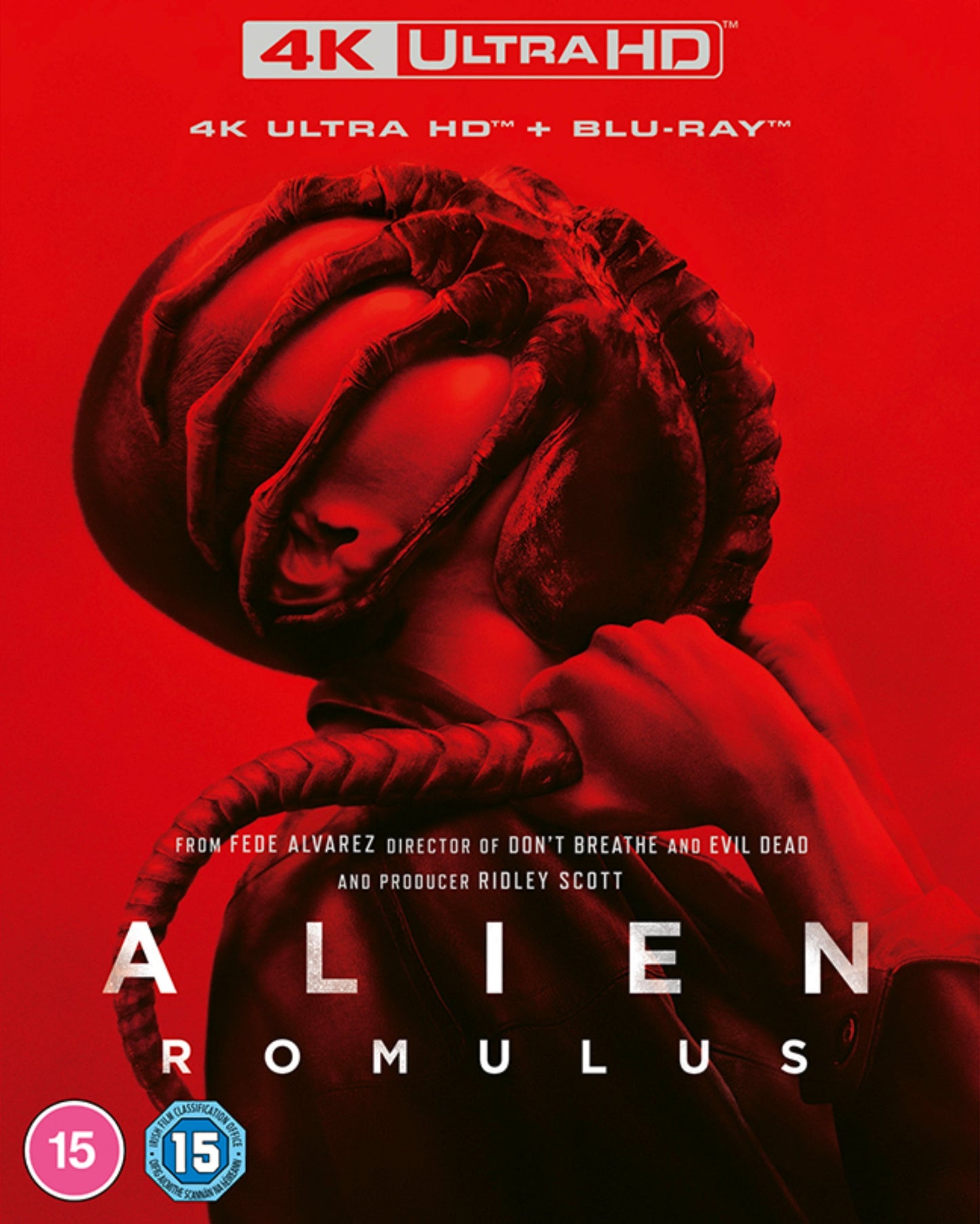 “Alien Romulus” Blu-ray cover featuring a close-up of a distressed face.