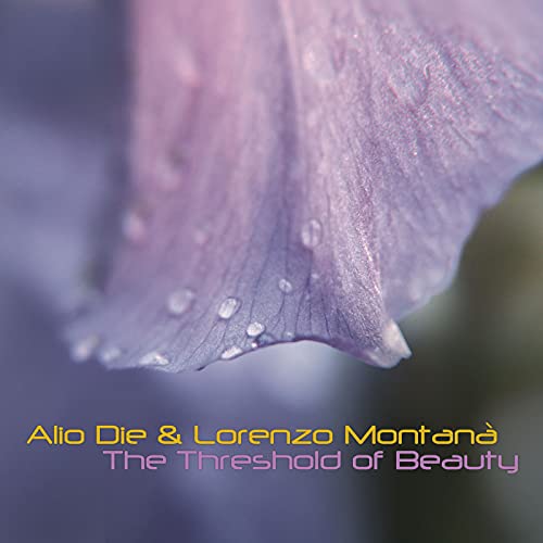 CD cover with a close-up, dewdropped purple flower and album title.