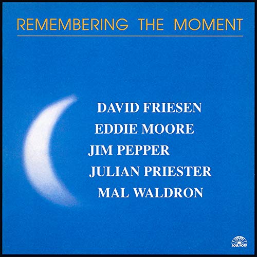 CD cover: blue background, white crescent moon, and artist names.