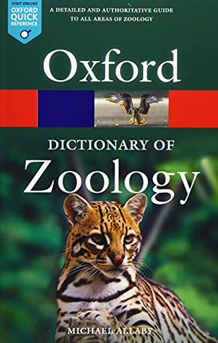 Oxford Dictionary of Zoology book cover featuring an eagle and ocelot.